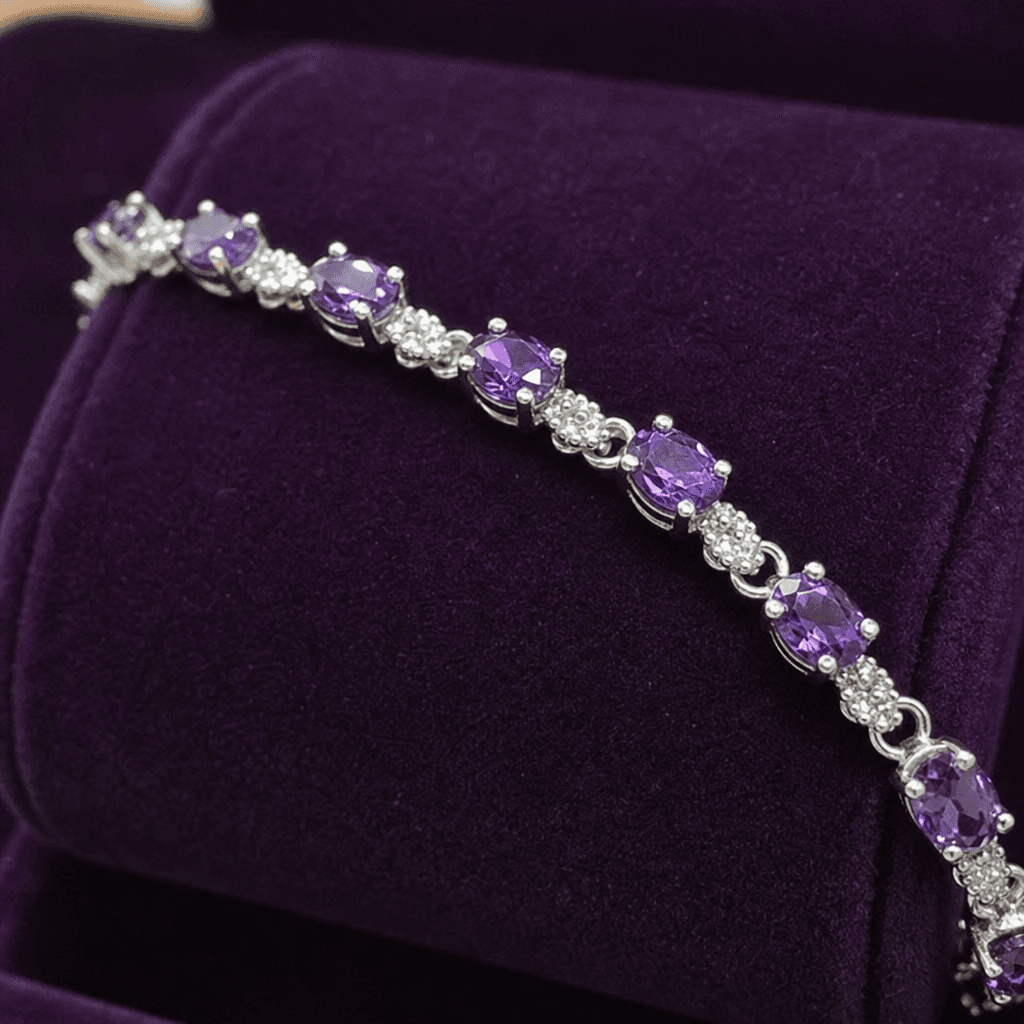 A birthstone bracelet displayed on velvet